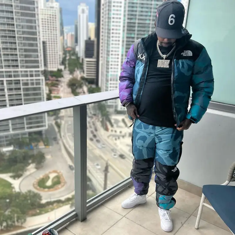 Babyface Ray outfit in The North Face, Nike, and Kaws, 2022