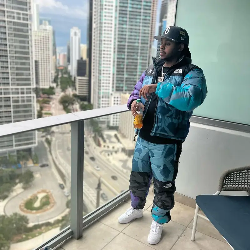 Babyface Ray outfit in The North Face, Nike, and Kaws, 2022