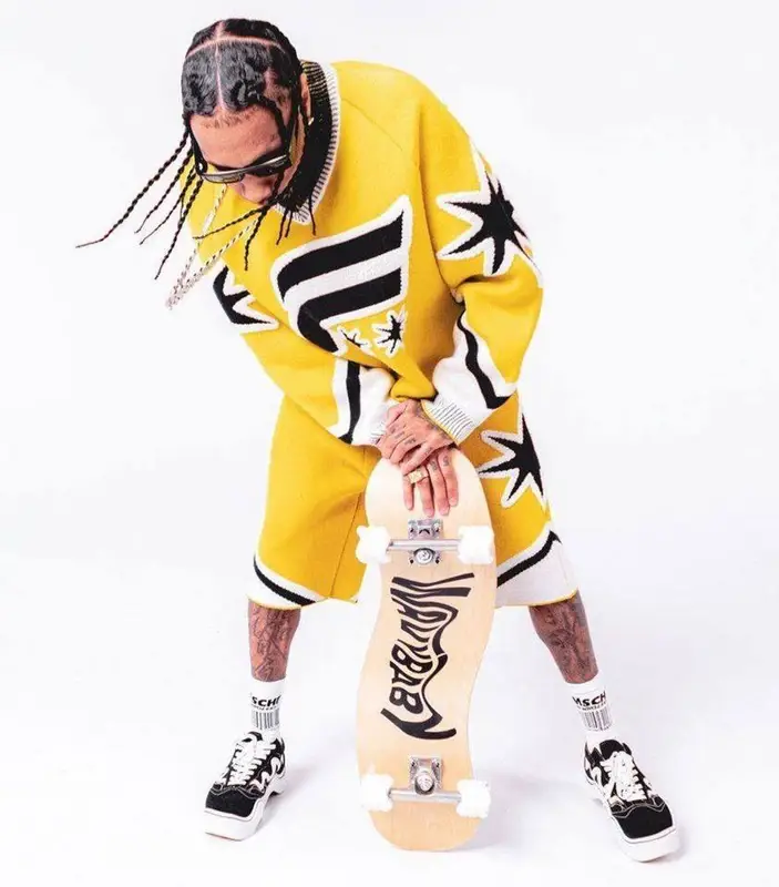 Tyga outfit in Formy Studio, Prada, and Avril 8790, 2022