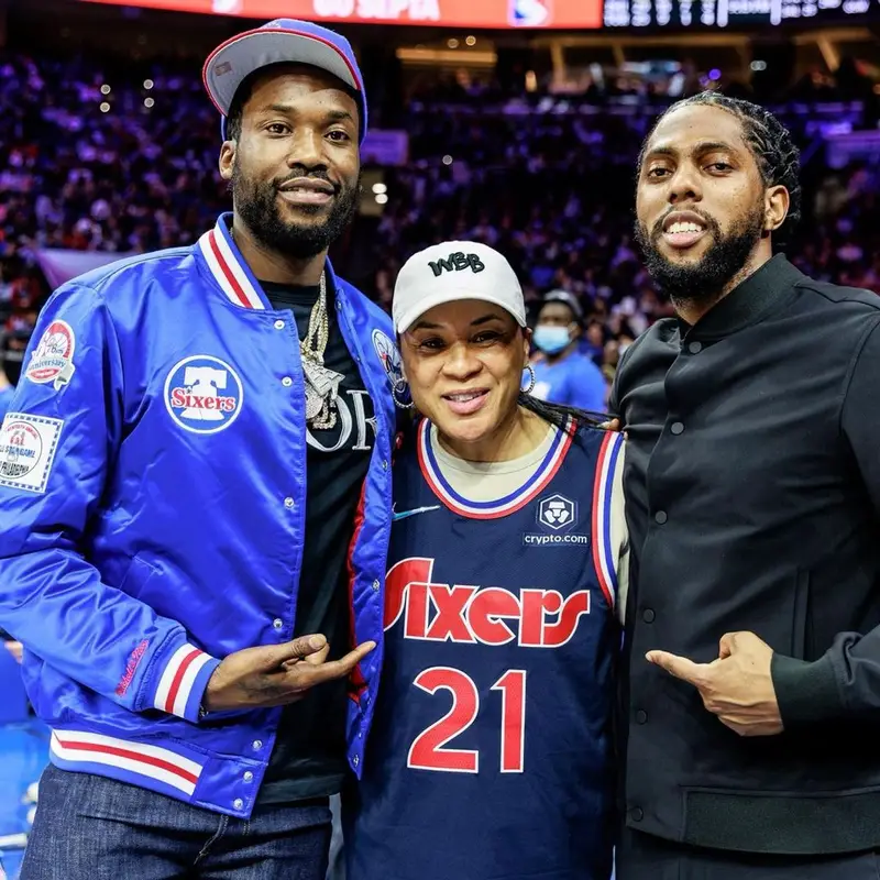 Meek Mill outfit in Dior, Nike, and Mitchell & Ness, 2022
