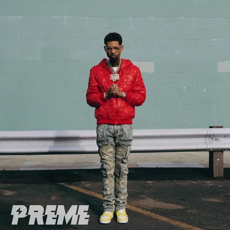 PnB Rock outfit in Louis Vuitton and Ryan Knew, 2022