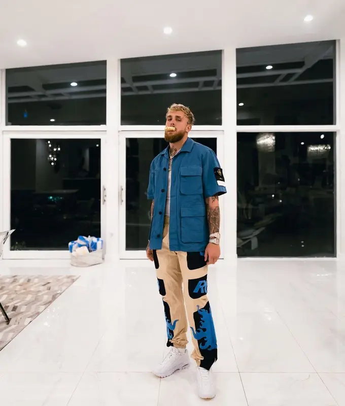 Jake Paul outfit in Stone Island, Nike, and Drake Merch, 2022