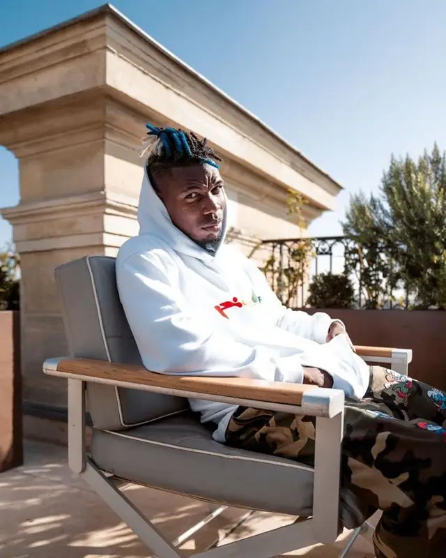 Paul Pogba outfit in Pioche and Supreme, 2021