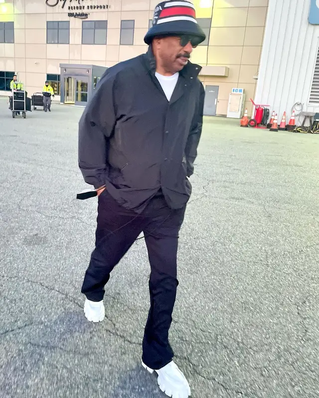 Steve Harvey outfit in Balenciaga and Prada, 2022