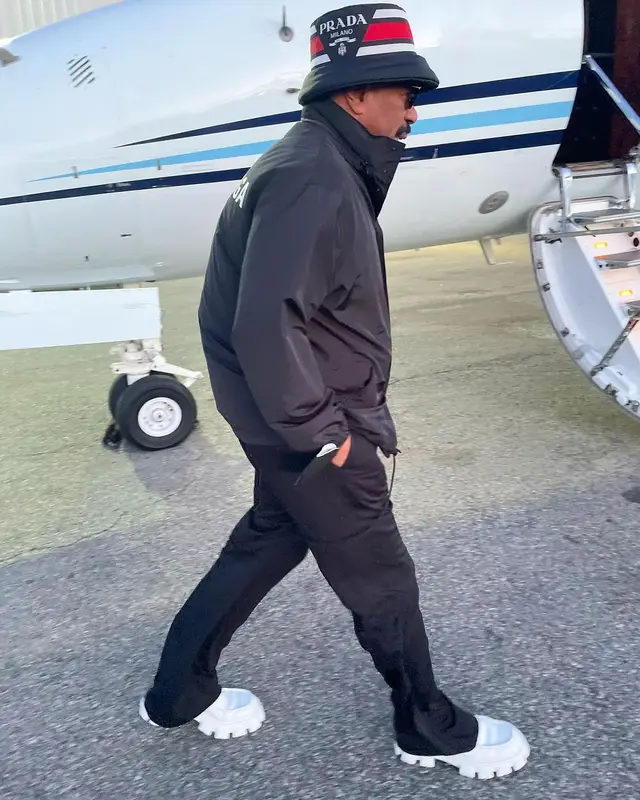 Steve Harvey outfit in Balenciaga and Prada, 2022