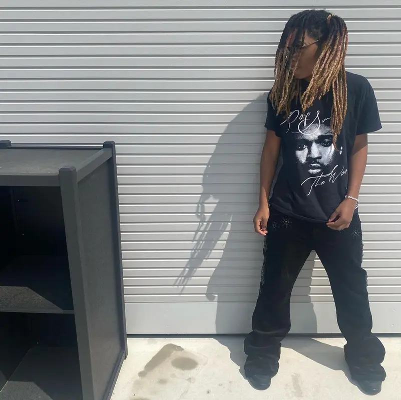 Tana outfit in Vlone, Jordan, and Pop Smoke Merch, 2022