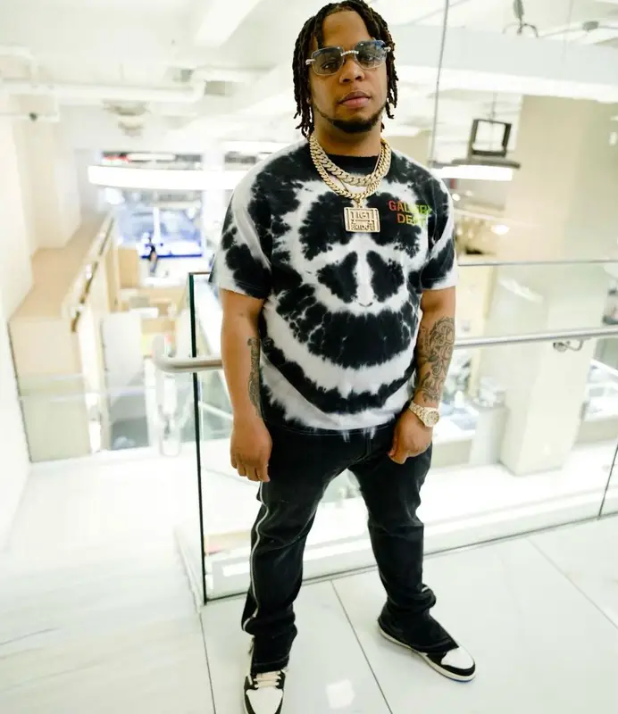 Don Q outfit in Gallery Dept., Nike, and Travis Scott Merch, 2022