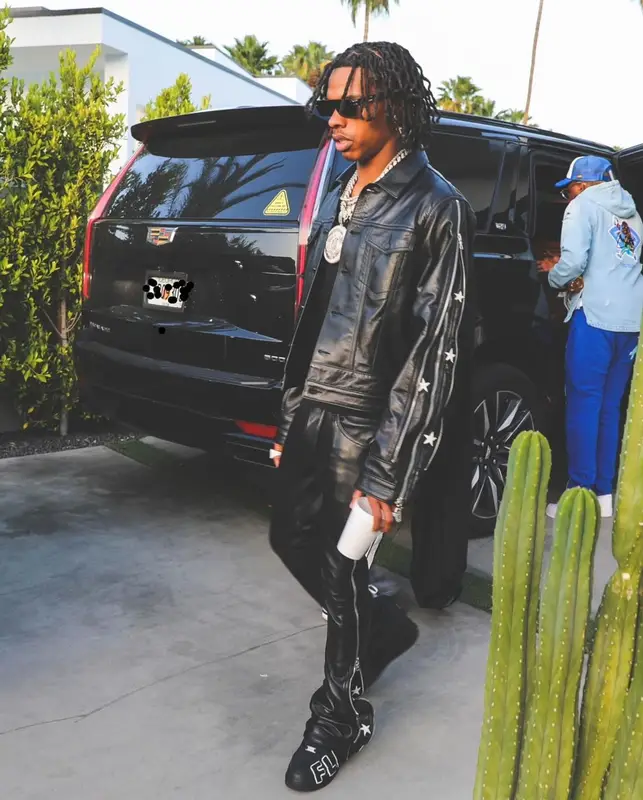 Lil Baby outfit in Cease±Desist, Nike, and Dior, 2022