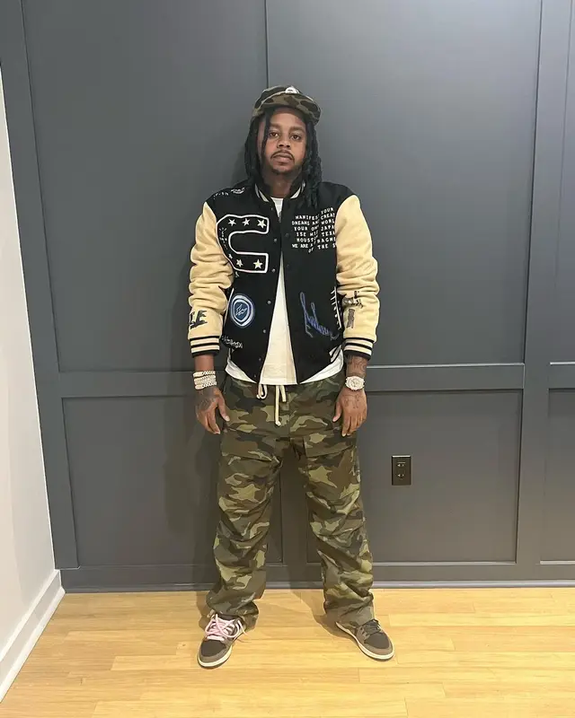 Babyface Ray outfit in Travis Scott Merch, Bape, and New Era, 2022