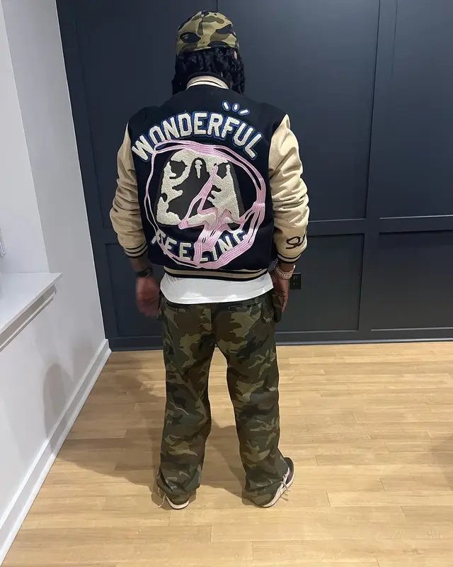 Babyface Ray outfit in Travis Scott Merch, Bape, and New Era, 2022