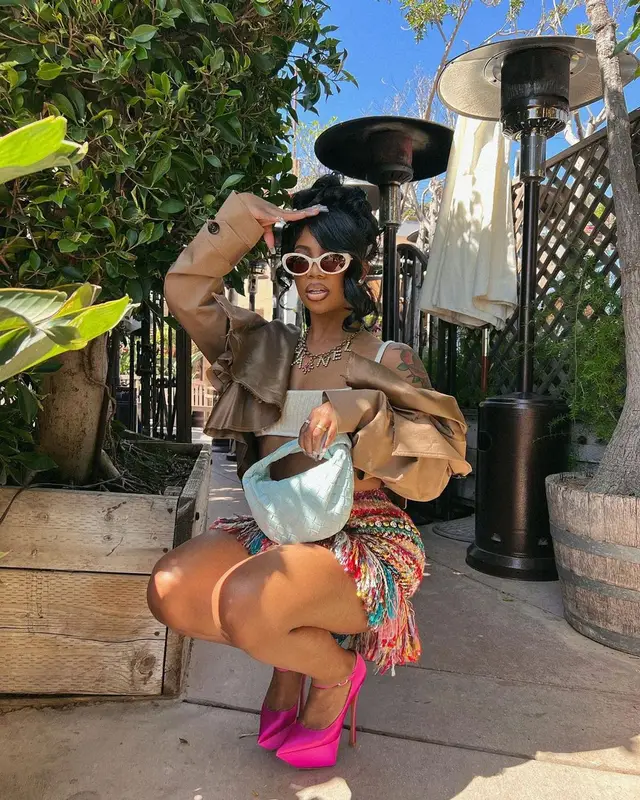 De'arra Taylor outfit in Danielle Guizio, Bottega Veneta, and Area, 2022