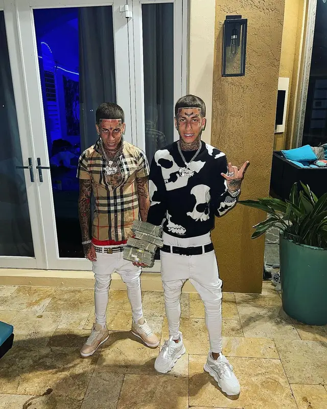 Kodiyakredd outfit in Alexander McQueen, Versace, and MCM, 2022