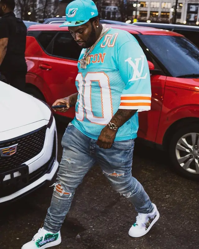 Peezy outfit in Louis Vuitton, Amiri, and New Era, 2022