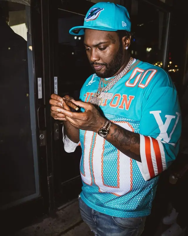Peezy outfit in Louis Vuitton, Amiri, and New Era, 2022