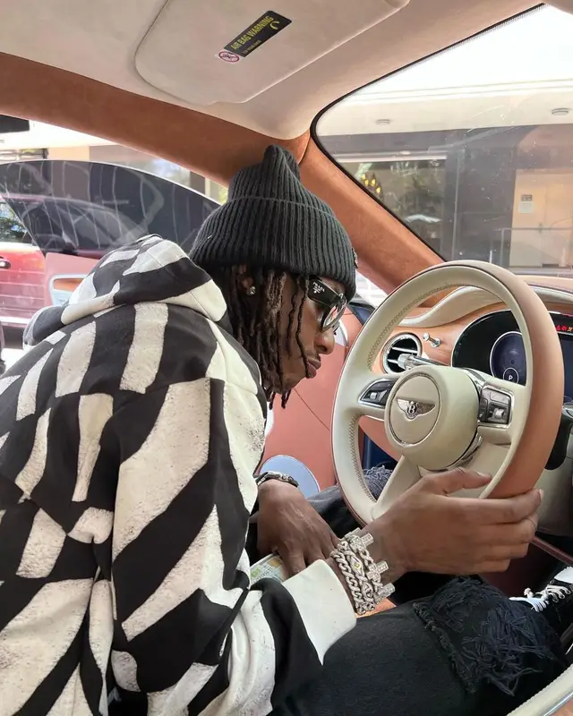 Rich The Kid outfit in Celine, Prada, and Louis Vuitton, 2022