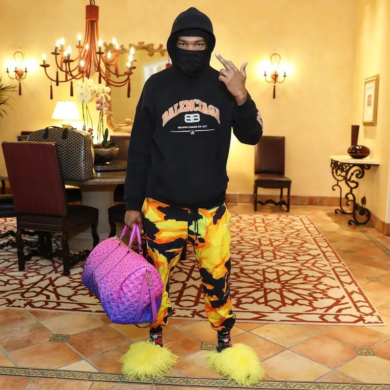 Lil Baby outfit in Balenciaga, Celine, and Louis Vuitton, 2022