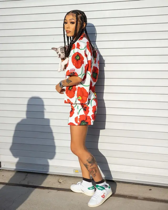 Coi Leray outfit in Kenzo, Gucci, and The North Face, 2022