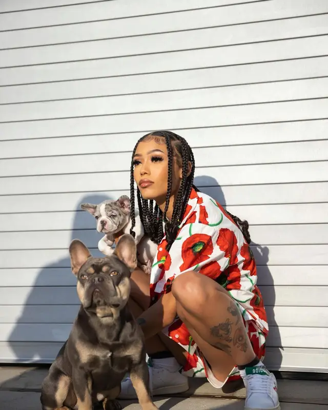 Coi Leray outfit in Kenzo, Gucci, and The North Face, 2022