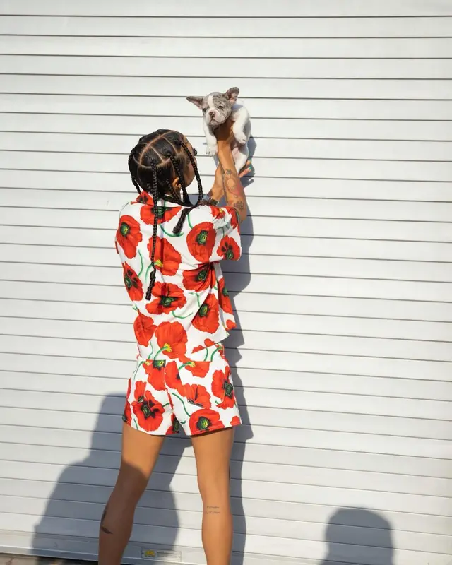Coi Leray outfit in Kenzo, Gucci, and The North Face, 2022