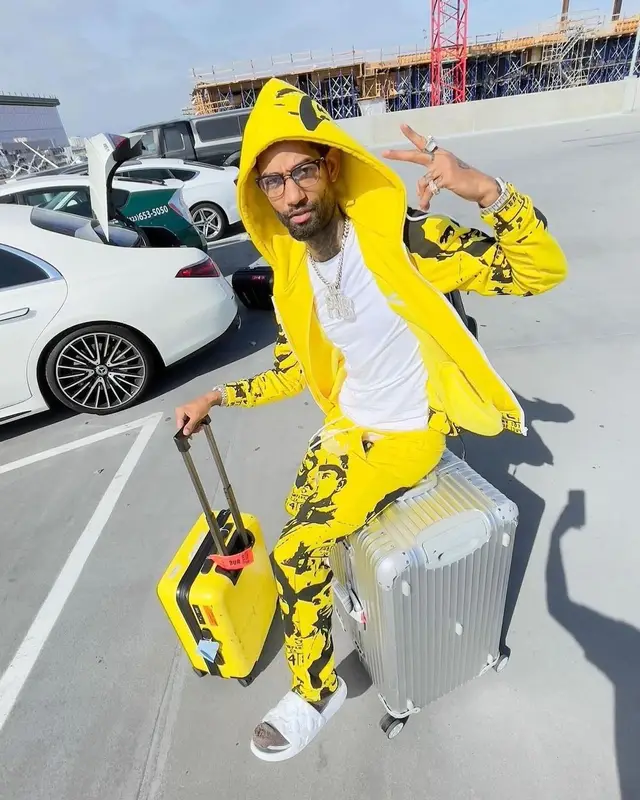 PnB Rock outfit in Cough Syrup, Louis Vuitton, and Asaali, 2022