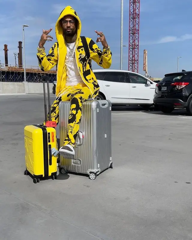 PnB Rock outfit in Cough Syrup, Louis Vuitton, and Asaali, 2022