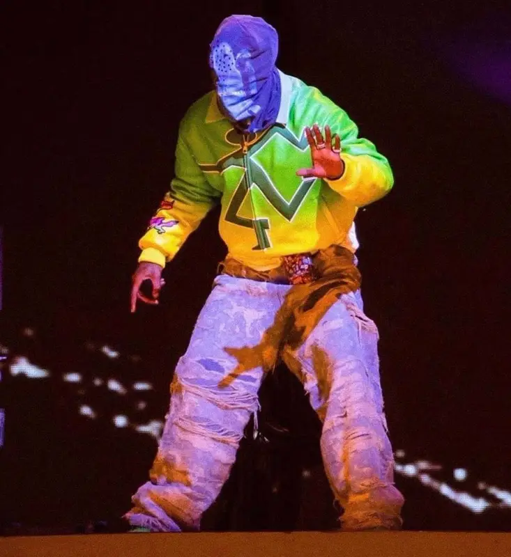 Travis Scott outfit in Louis Vuitton, Travis Scott Merch, and Takashi Murakami, 2021