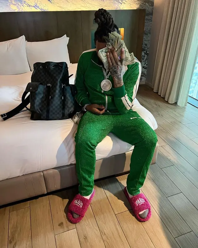 Money Man outfit in Palm Angels, Louis Vuitton, and Balenciaga, 2022