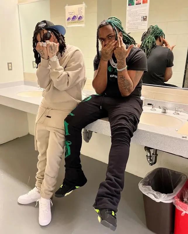 Young M.A outfit in Fear of God, Nike, and Louis Vuitton, 2022