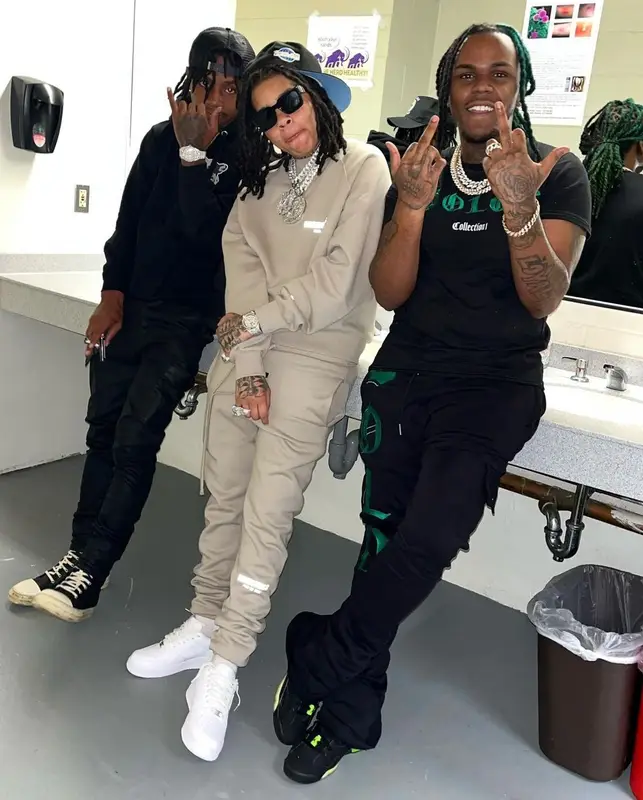 Young M.A outfit in Fear of God, Nike, and Louis Vuitton, 2022