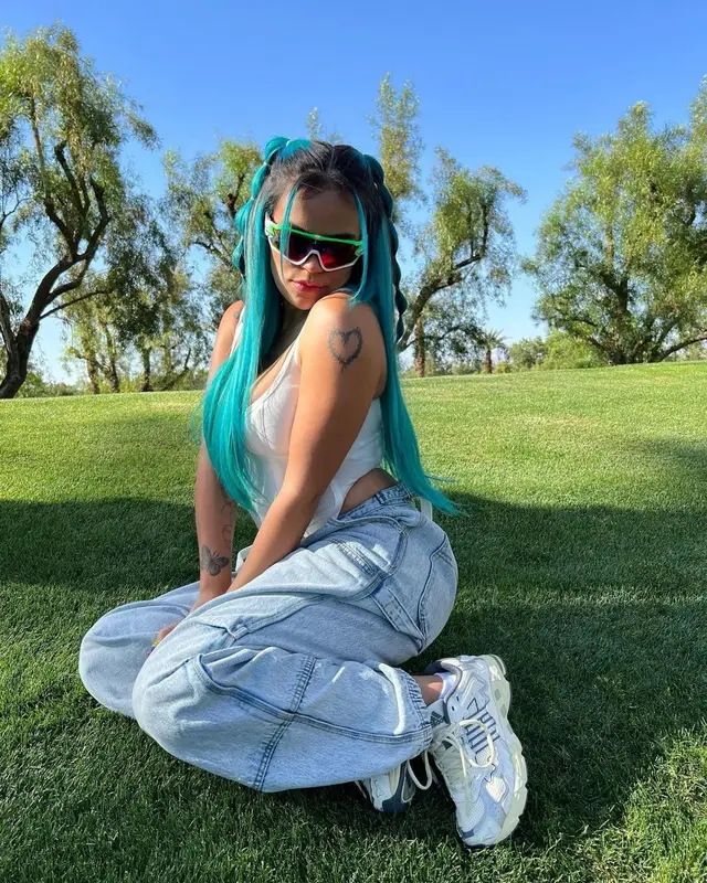 Karol G outfit in Dion Lee, Alexander Wang, and Oakley, 2022