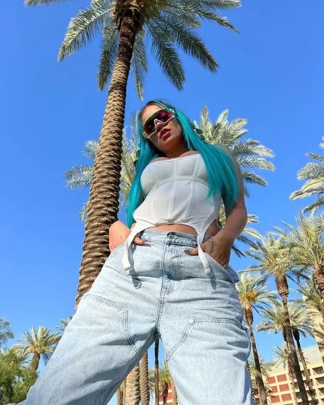 Karol G outfit in Dion Lee, Alexander Wang, and Oakley, 2022
