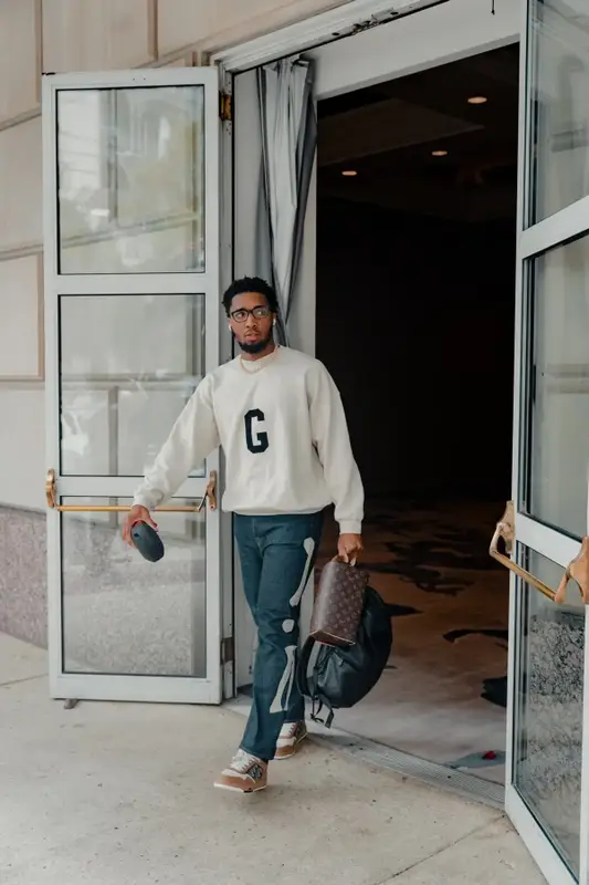 Donovan Mitchell outfit in Fear of God, Kapital, and Dior, 2022