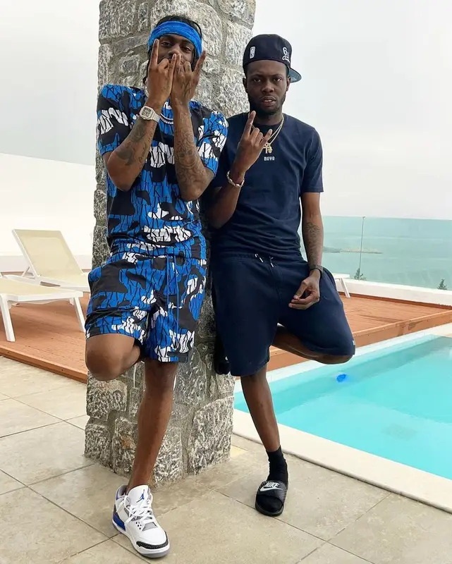 Russ Millions outfit in Jordan, New Era, and Moving Kilos, 2022