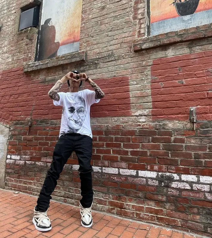 Yung Fazo outfit in Vogalstand, Prada, and Moncler, 2022
