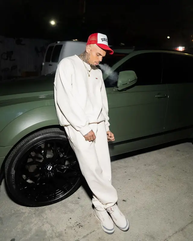 Chris Brown outfit in Supreme and Jordan, 2022