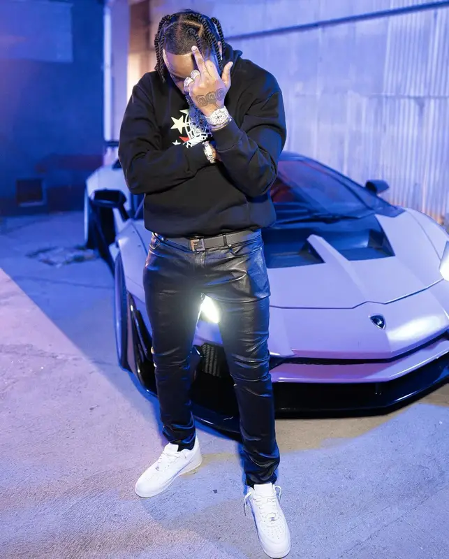 Fivio Foreign outfit in Saint Laurent, Nike, and Fendi, 2022