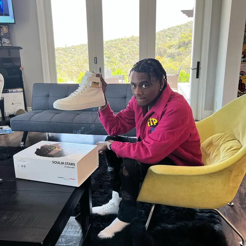 Soulja Boy outfit in Fuck The Population, Amiri, and Soulja Stars, 2022