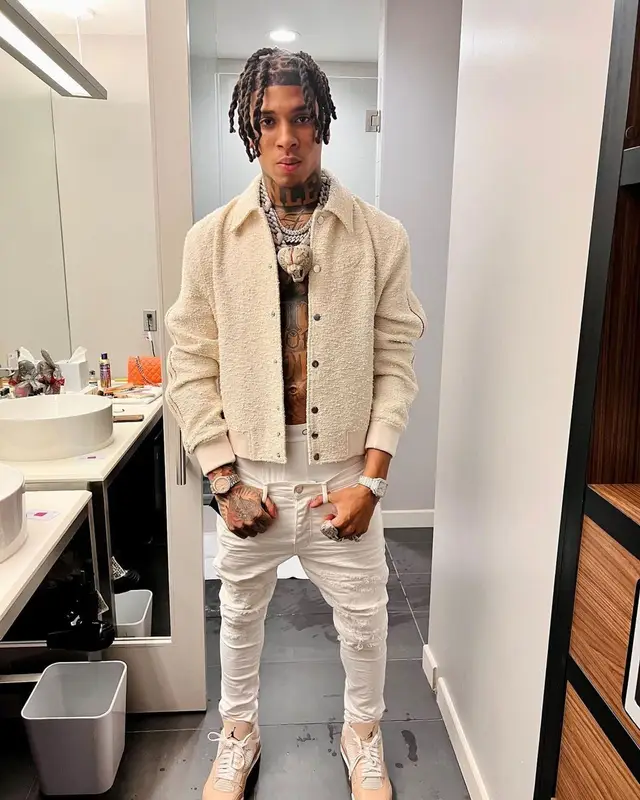 NLE Choppa outfit in Amiri, Purple Brand, and Calvin Klein, 2022