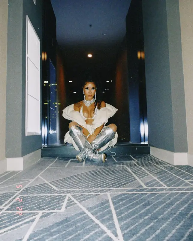 Jhene Aiko outfit in Ding Yun Zhang, Area, and Dries Van Noten, 2022
