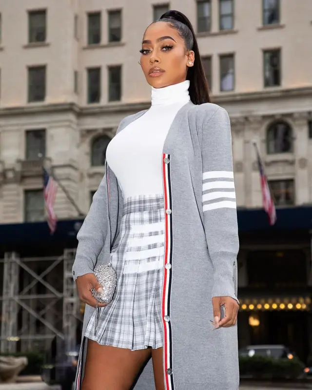 La La outfit in Thom Browne and Amina Muaddi, 2022