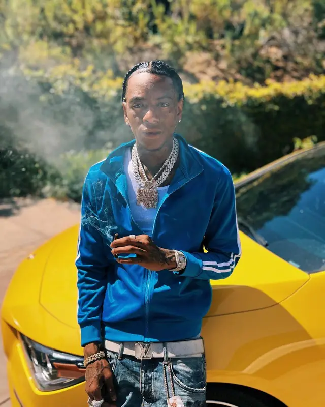 Soulja Boy outfit in Purple Brand, Nike, and Louis Vuitton, 2022