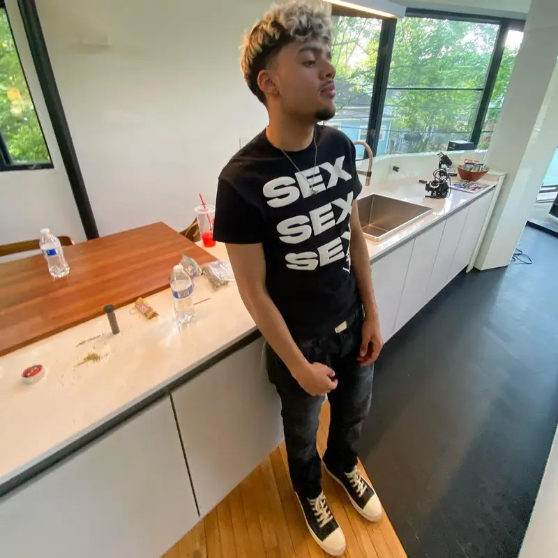 Eli Juggz outfit in Korrupt, Purple Brand, and Rick Owens, 2022