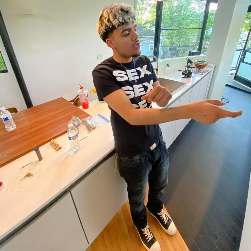 Eli Juggz outfit in Korrupt, Purple Brand, and Rick Owens, 2022