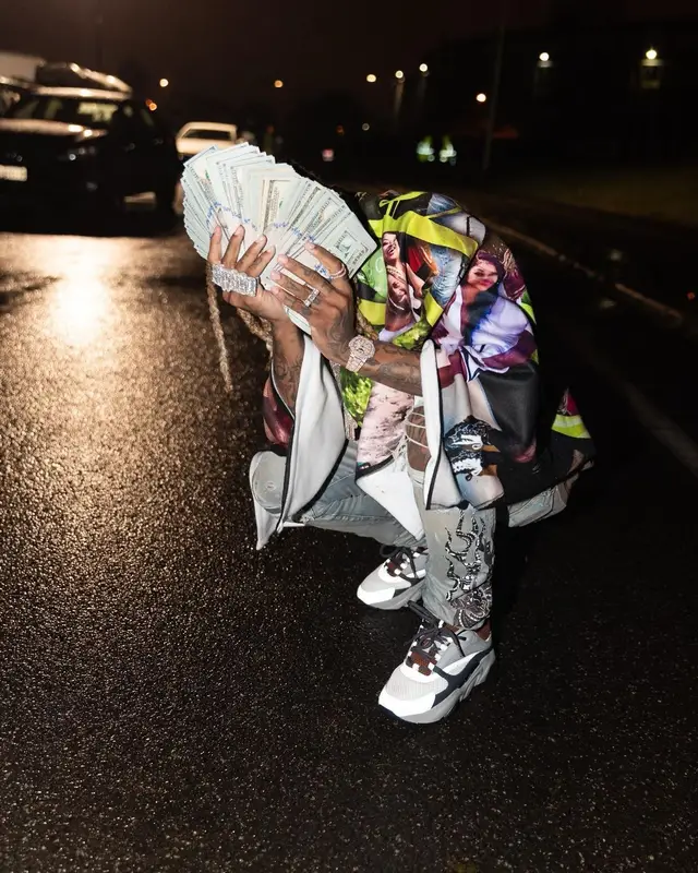 Lil Durk outfit in Gallery Dept., Amiri, and Dior, 2022