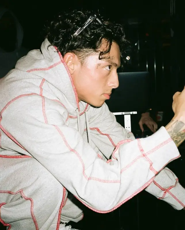 Central Cee outfit in Supreme, Nike, and Louis Vuitton, 2022