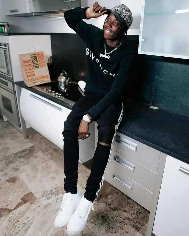 Melvoni outfit in Givenchy, Amiri, and Louis Vuitton, 2022