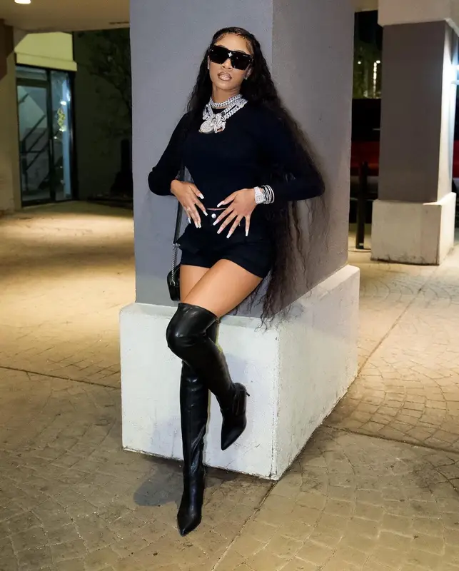 Lakeyah outfit in Diesel, Gucci, and Louis Vuitton, 2022