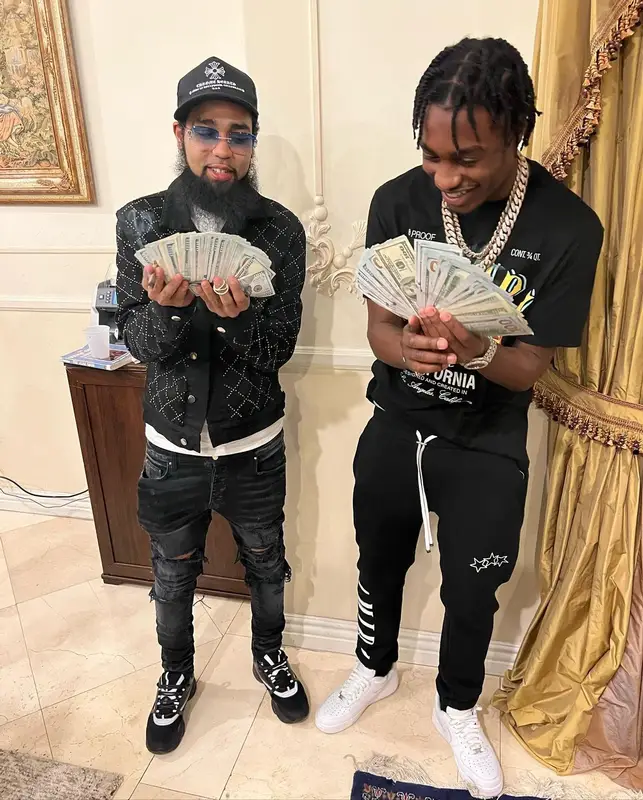 Lil Tjay outfit in Amiri and Nike, 2022