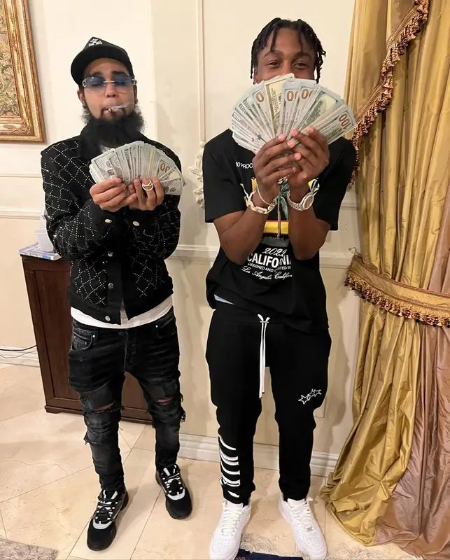 Lil Tjay outfit in Amiri and Nike, 2022