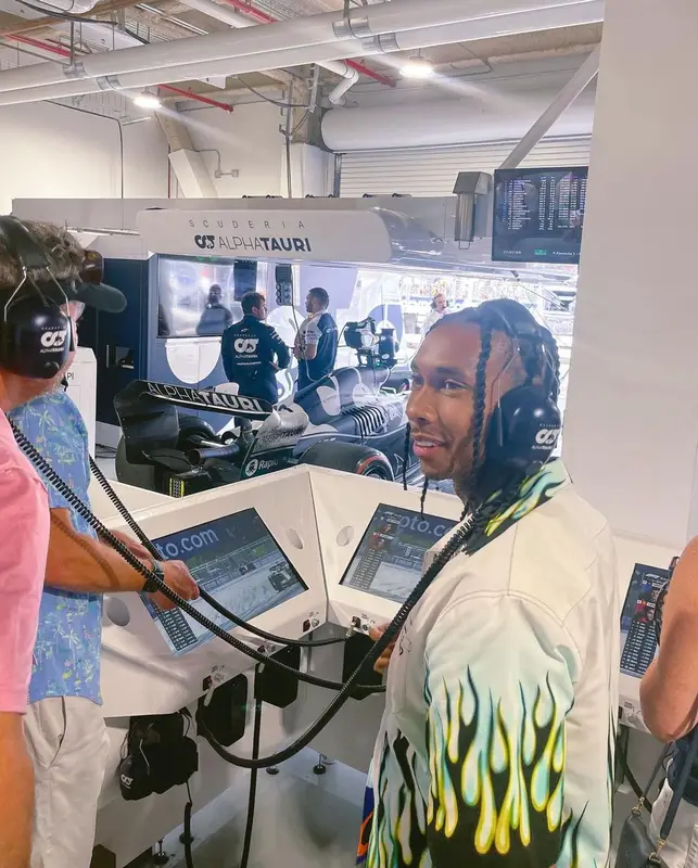 Tyga outfit in Wavy Baby, Prada, and Nike, 2022